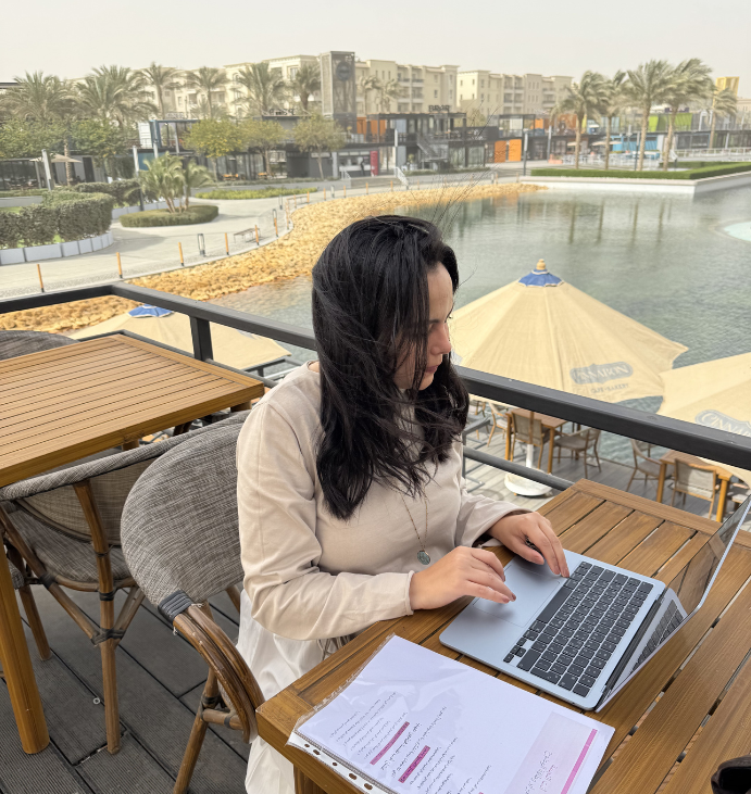 Raham Ali working on a laptop- Digital marketing